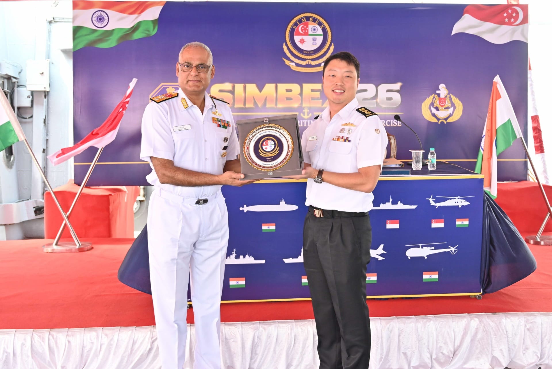 Republic of Singapore Navy (RSN) Fleet Commander, Colonel Bertram Ang (right) and Chief Staff Officer (Operations), Headquarters Eastern Naval Command (HQENC) Rear Admiral Manoj K Jha, at the Opening Ceremony of SIMBEX 2026.